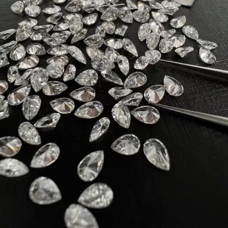 خاتم ألماس من الذهب عيار 18 قيراطًا مقطوع على شكل كمثرى ومُزرع في المختبر من مجوهرات ANSTER مصنوع يدويًا وفقًا لمعايير أخلاقية 